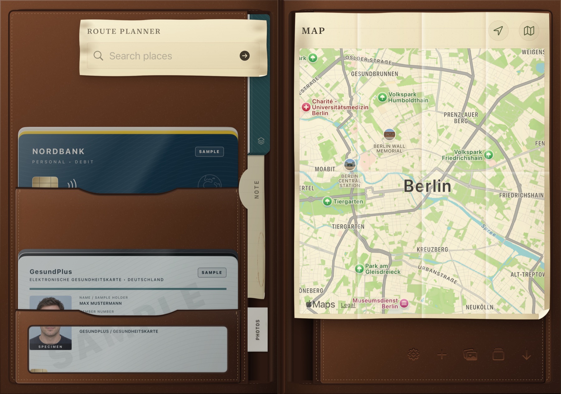 A folded paper map of Berlin with a route planner on the other leaf.